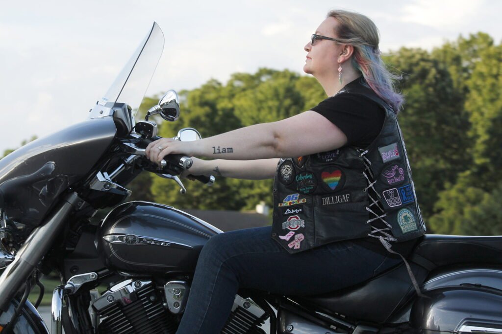 Woman pursuing her dreams, riding a motorcycle
