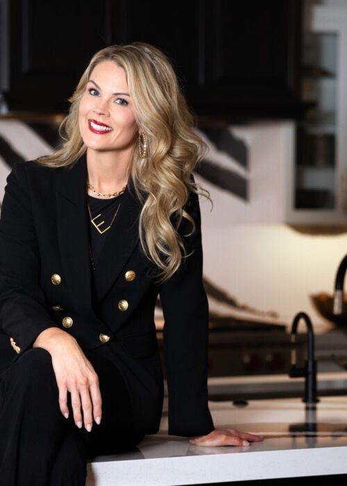 Professional headshot for business of realtor Erika Adornetto in black jacket