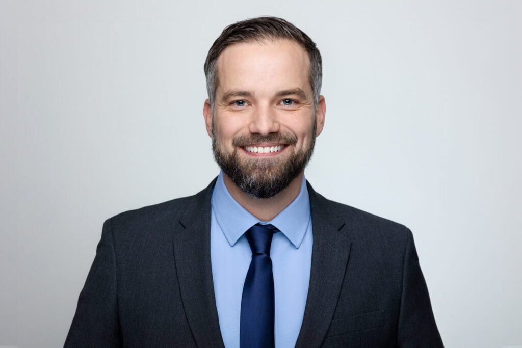 Professional headshot for business of smiling man