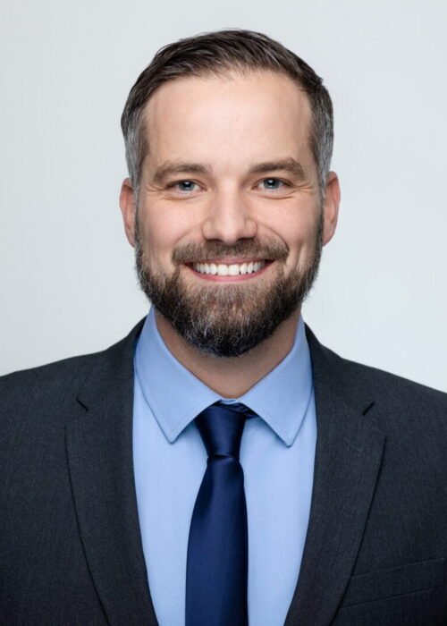 Professional headshot for business of smiling man